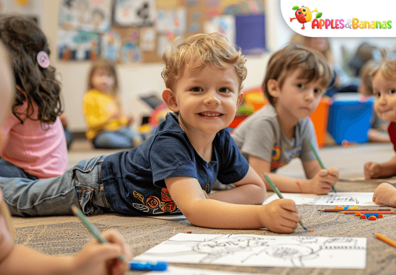 A group of young children engaged in playful learning activities with a teacher, surrounded by colorful educational toys in a bright classroom.